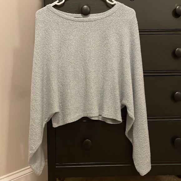 This is a blueish gray cropped sweater from Charlotte Avery - Picture 1 of 3